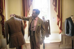 Event Party : WASHINGTON, DC - MAY 14: Nick Foulkes, (L) curator of the exhibition, gives a tour to attendees at Savile Row Bespoke and America at the British Ambassador's Residence on May 14, 2015 in Washington, DC. (Photo by Greg Kahn/Getty Images for The British Embassy)